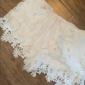 White lace shorts